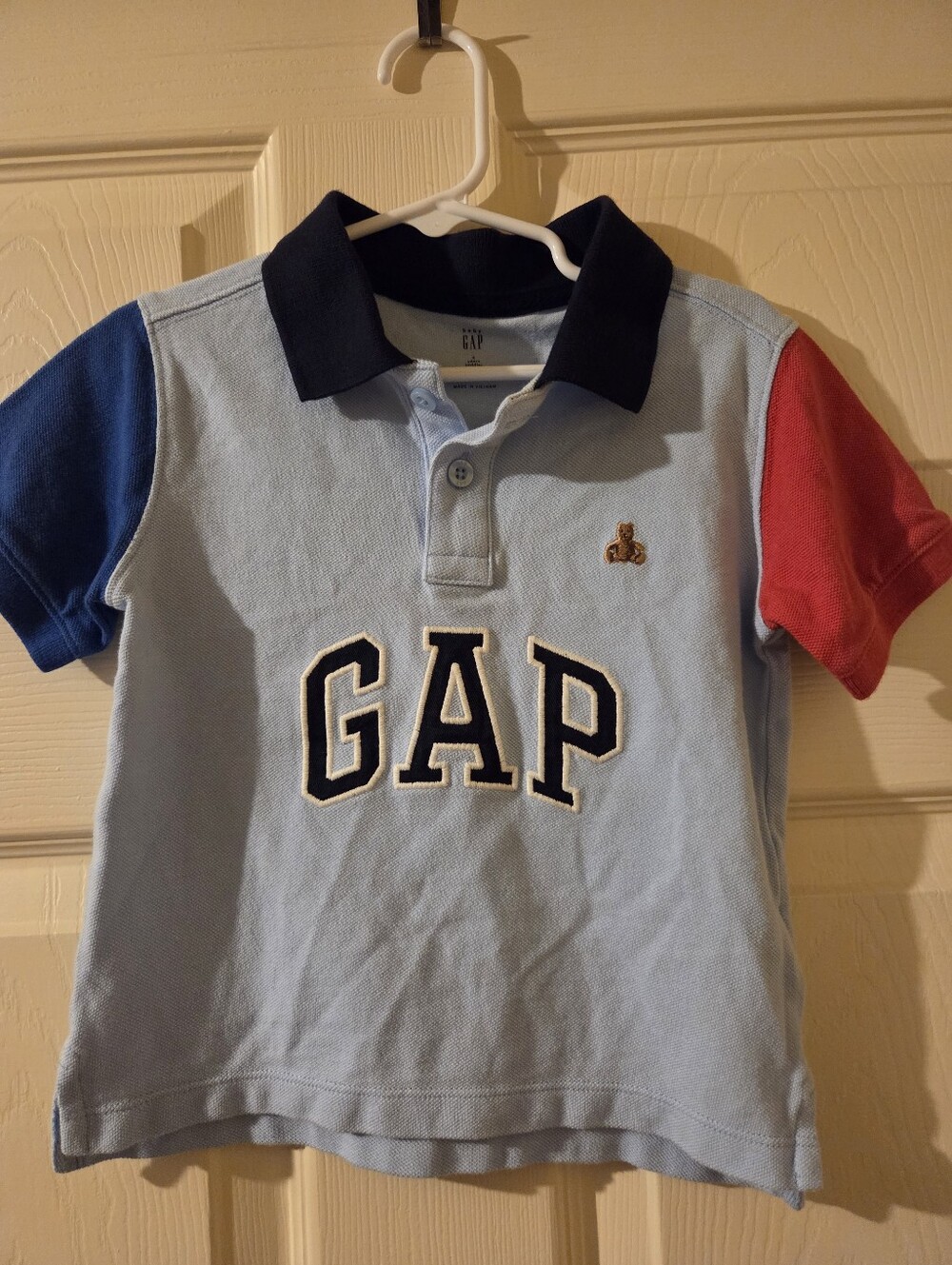 GAP Light Blue Polo with Navy Collar & Red and Blue Sleeves
